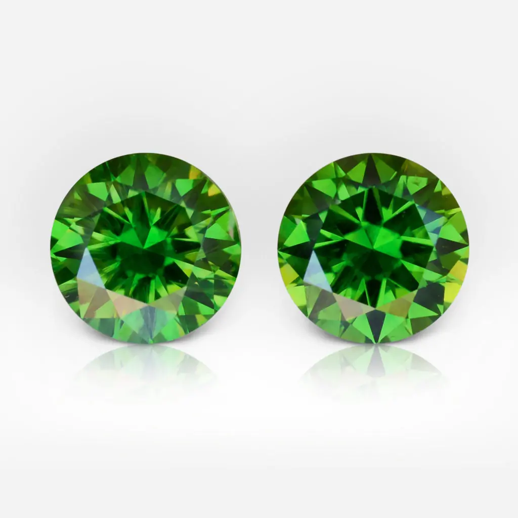 1.02 and 1.06 carat Pair of Round Shape Uralian Demantoid