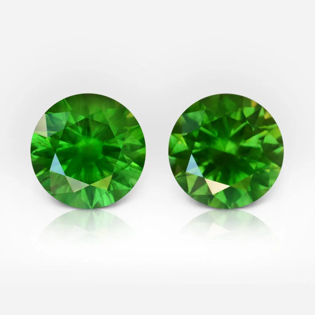 1.30 and 1.34 carat Pair of Round Shape Uralian Demantoid