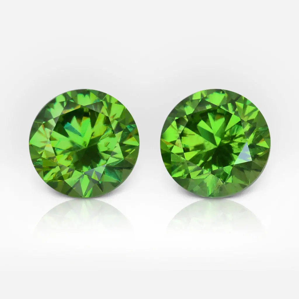 1.49 and 1.64 carat Pair of Round Shape Uralian Demantoid