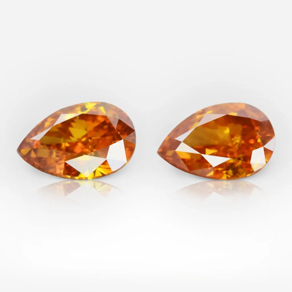 0.22 and 0.25 carat Pair of Fancy Deep Yellowish Orange SI2 Pear Shape Diamond GIA - picture 1