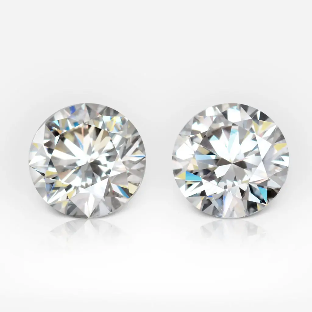 0.51 and 0.53 carat Pair of G / I VS2 Round Shape Diamond HRD