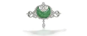 The belle époque emerald and diamond brooch