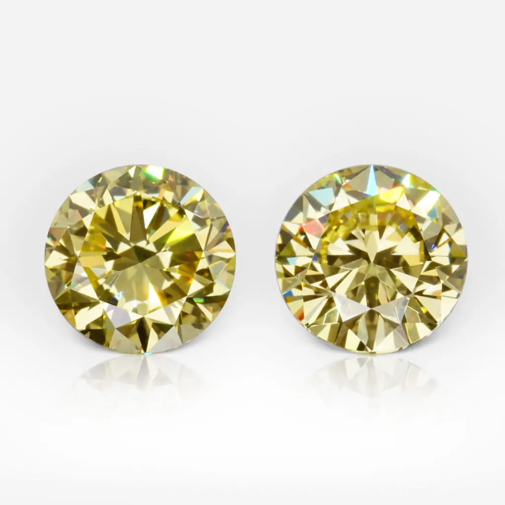 1.01 and 1.13 carat Pair of Fancy Intense Yellow VS1 / VS2 Studs Round Shape Diamonds GIA