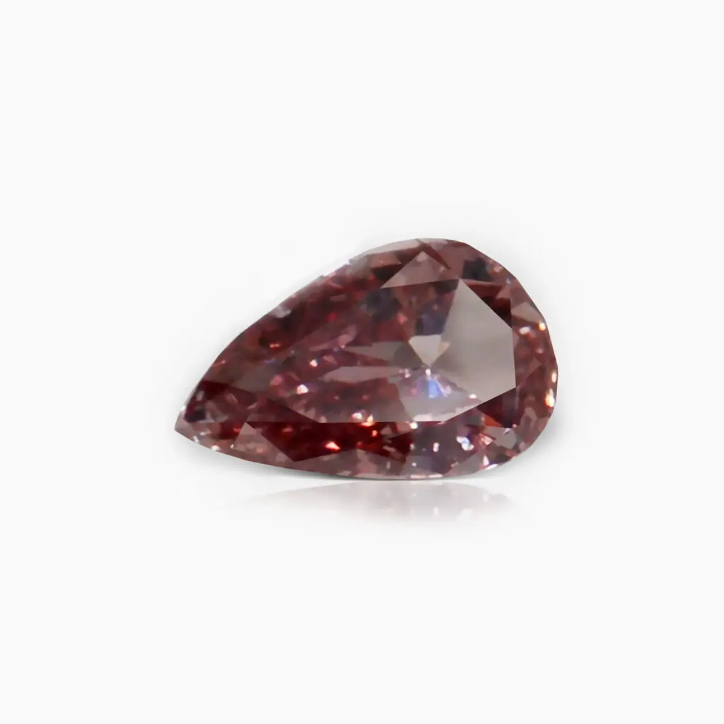 0.06 carat Fancy Intense Orange Pink Pear Shape GIA