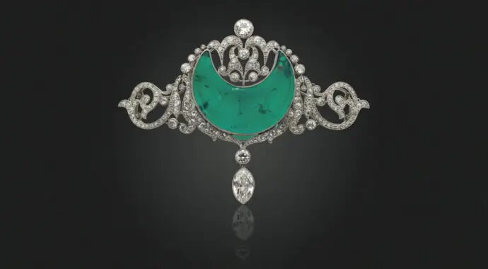 The belle époque emerald and diamond brooch