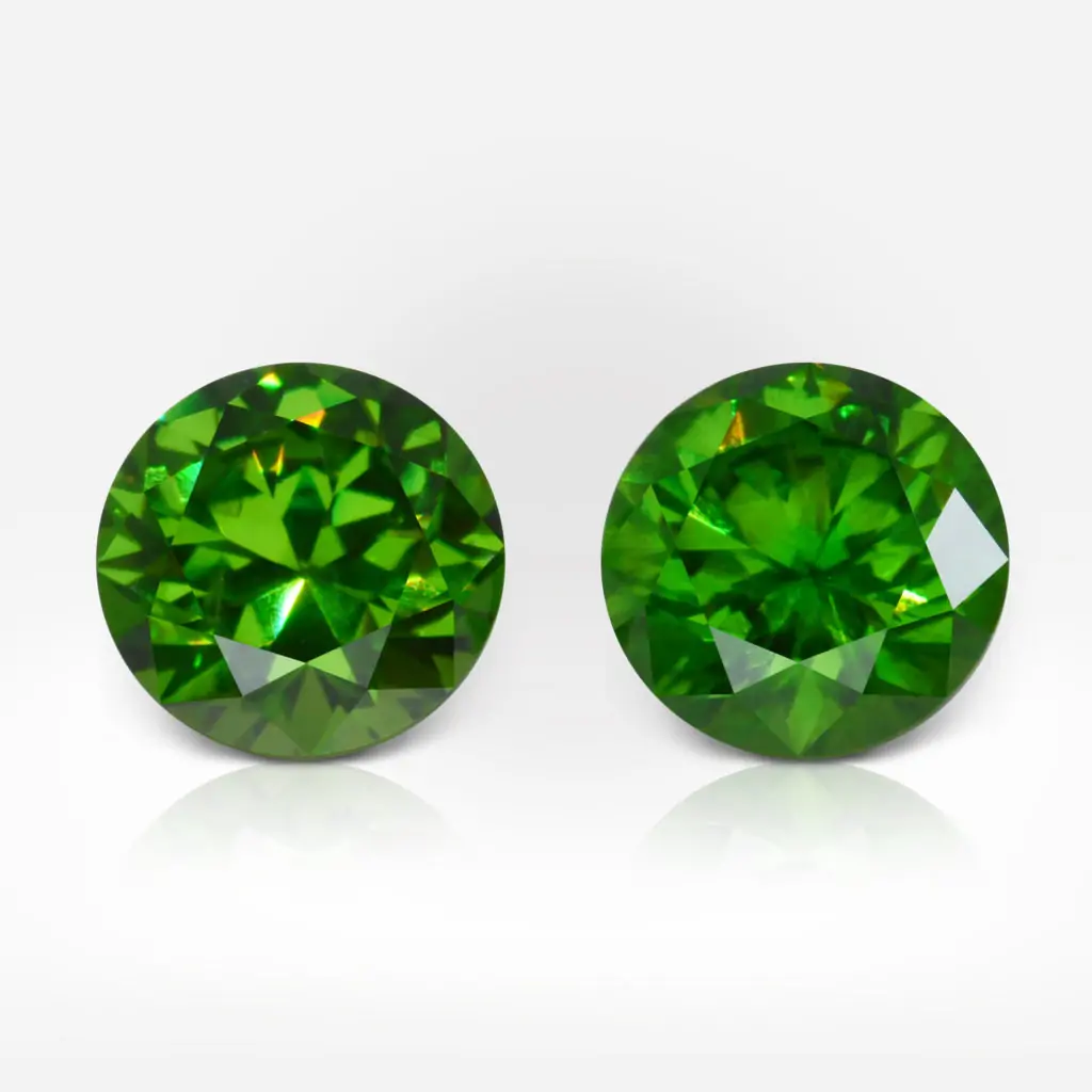 1.08 and 1.07 carat Pair of Round Shape Demantoid