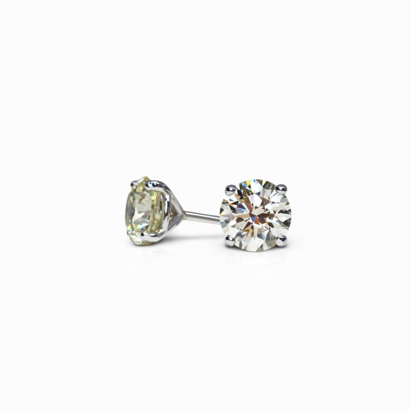 1.50 and 1.50 carat Pair of U-V / O-P VS2 Round Shape Diamonds Studs GIA - picture 1