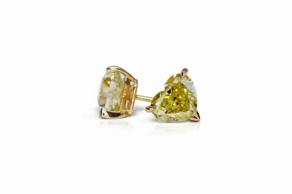 3.01 and 3.01 carat Pair of Studs Fancy Intense Yellow VS2/SI1 Heart Shape Diamonds GIA - picture 1