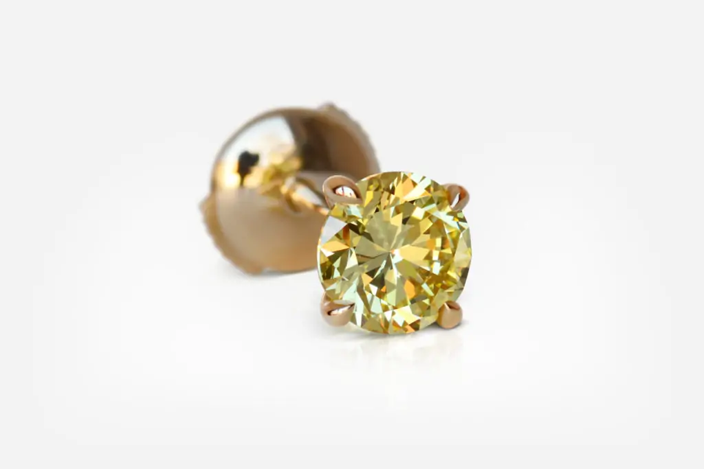 1.01 and 1.13 carat Pair of Fancy Intense Yellow VS1 / VS2 Round Shape Diamonds studs GIA - picture 1