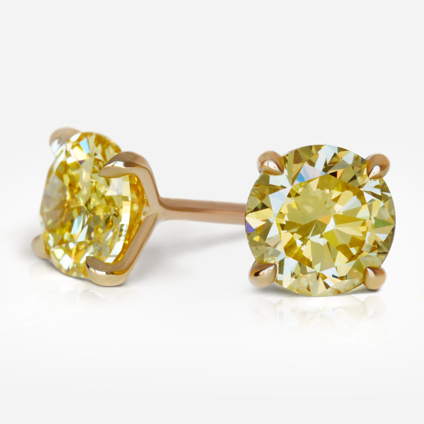 1.01 and 1.13 carat Pair of Fancy Intense Yellow VS1 / VS2 Round Shape Diamonds studs GIA - picture 1