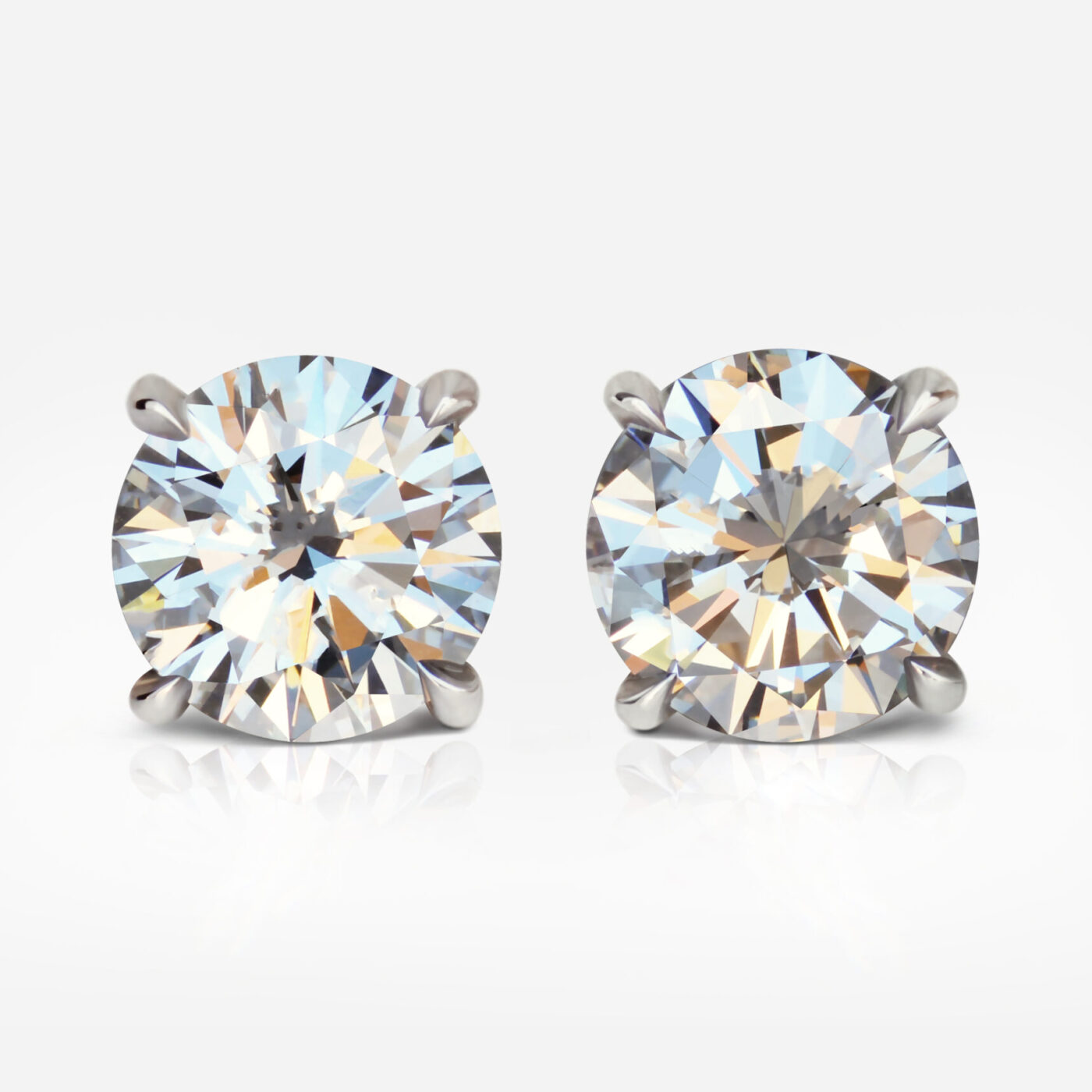 1.01 and 1.01 carat Studs Pair E VVS1 VS1 Round Shape Diamonds GIA - picture 1