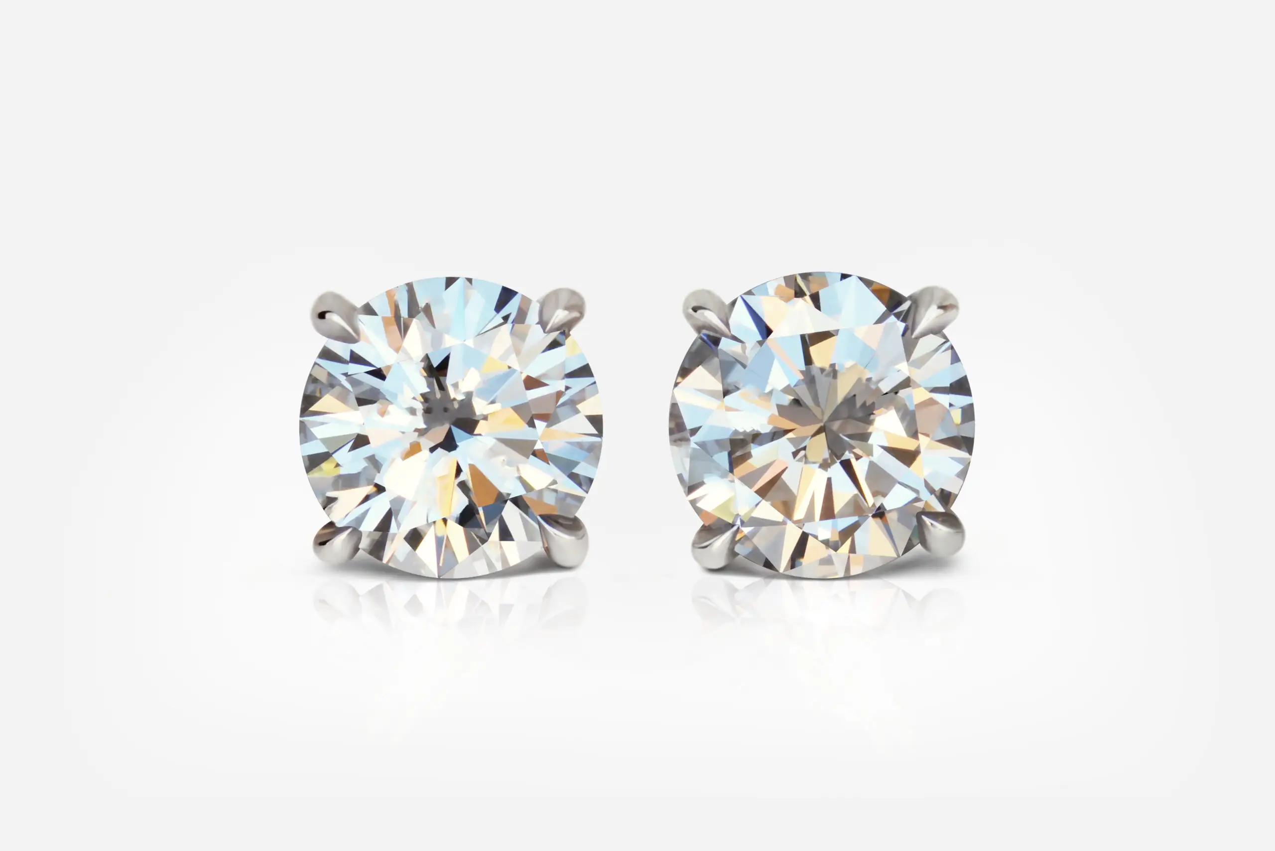 1.01 and 1.01 carat Studs Pair E VVS1 VS1 Round Shape Diamonds GIA - picture 1