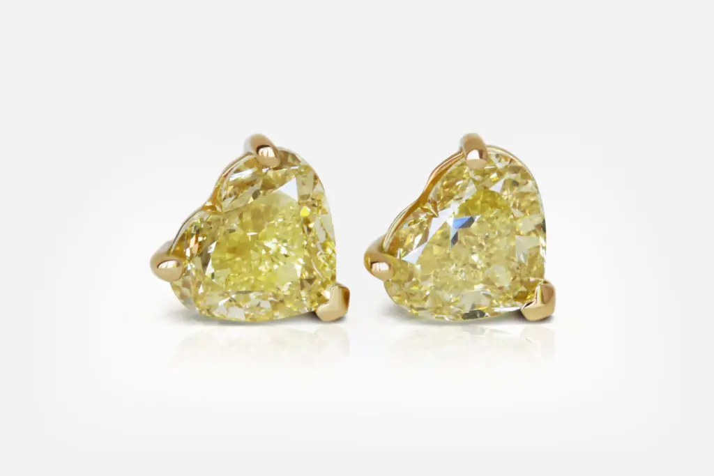 2 ct each Fancy Intense Yellow Heart Shape Diamond Studs GIA