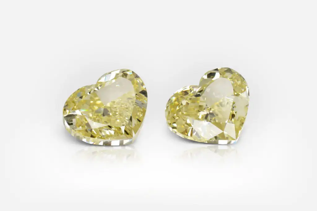 2 ct each Fancy Intense Yellow Heart Shape Diamond Studs GIA - picture 1