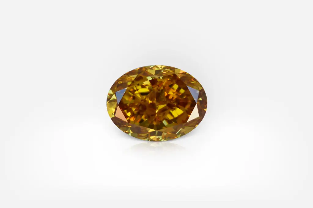 0.56 Carat Fancy Deep Brown-Orange VS2 Oval Shape Diamond GIA - picture 1