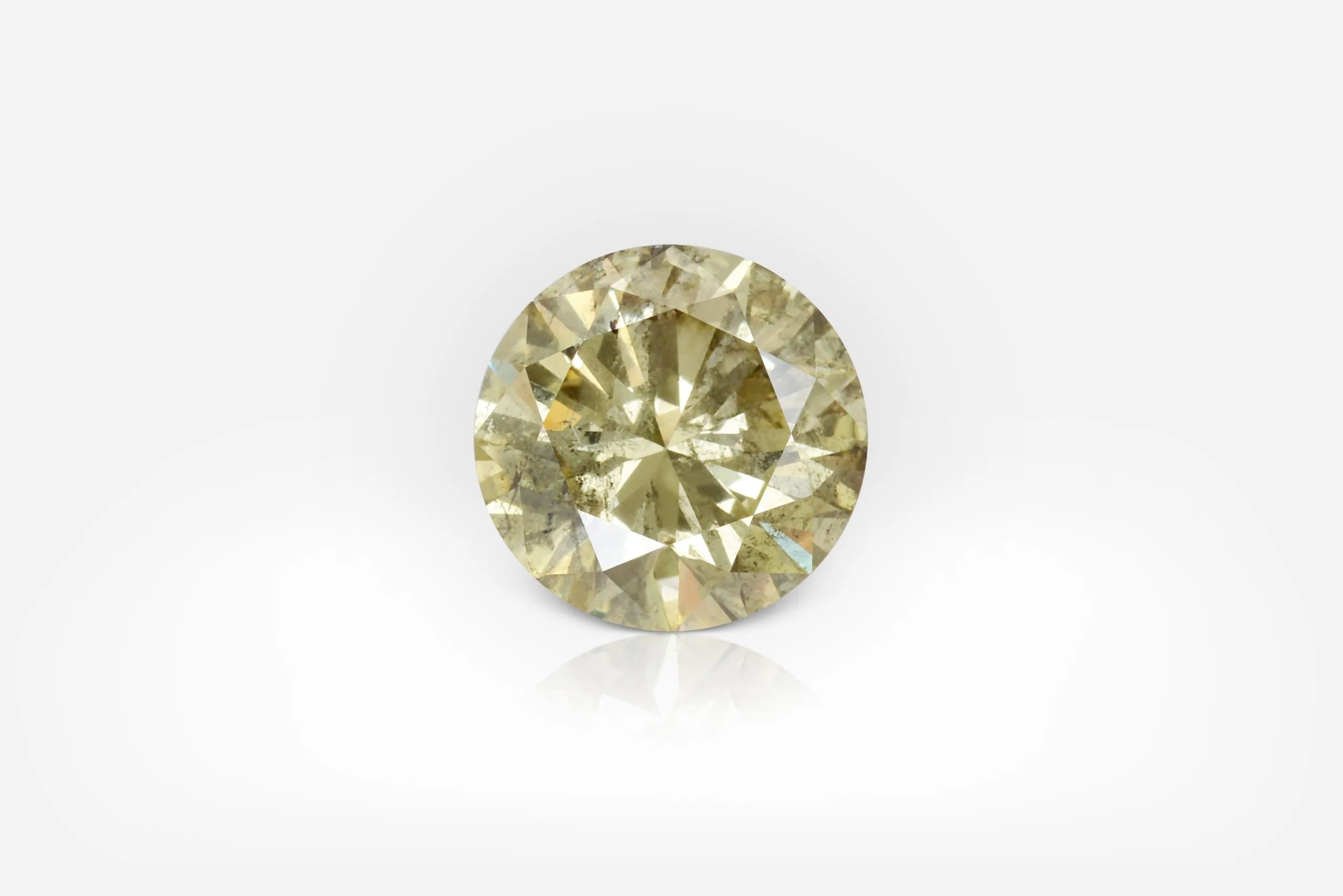 1.71 Carat Fancy Greenish Yellow Round Shape Diamond - picture 1