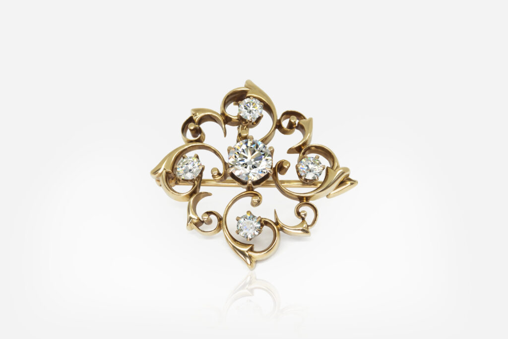 6.25 g 18k Gold and 1 ct Diamond Brooch