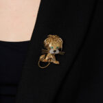 Van Cleef & Arpels Gem-set and diamond brooch, 'Lion ébouriffé' on Clothes