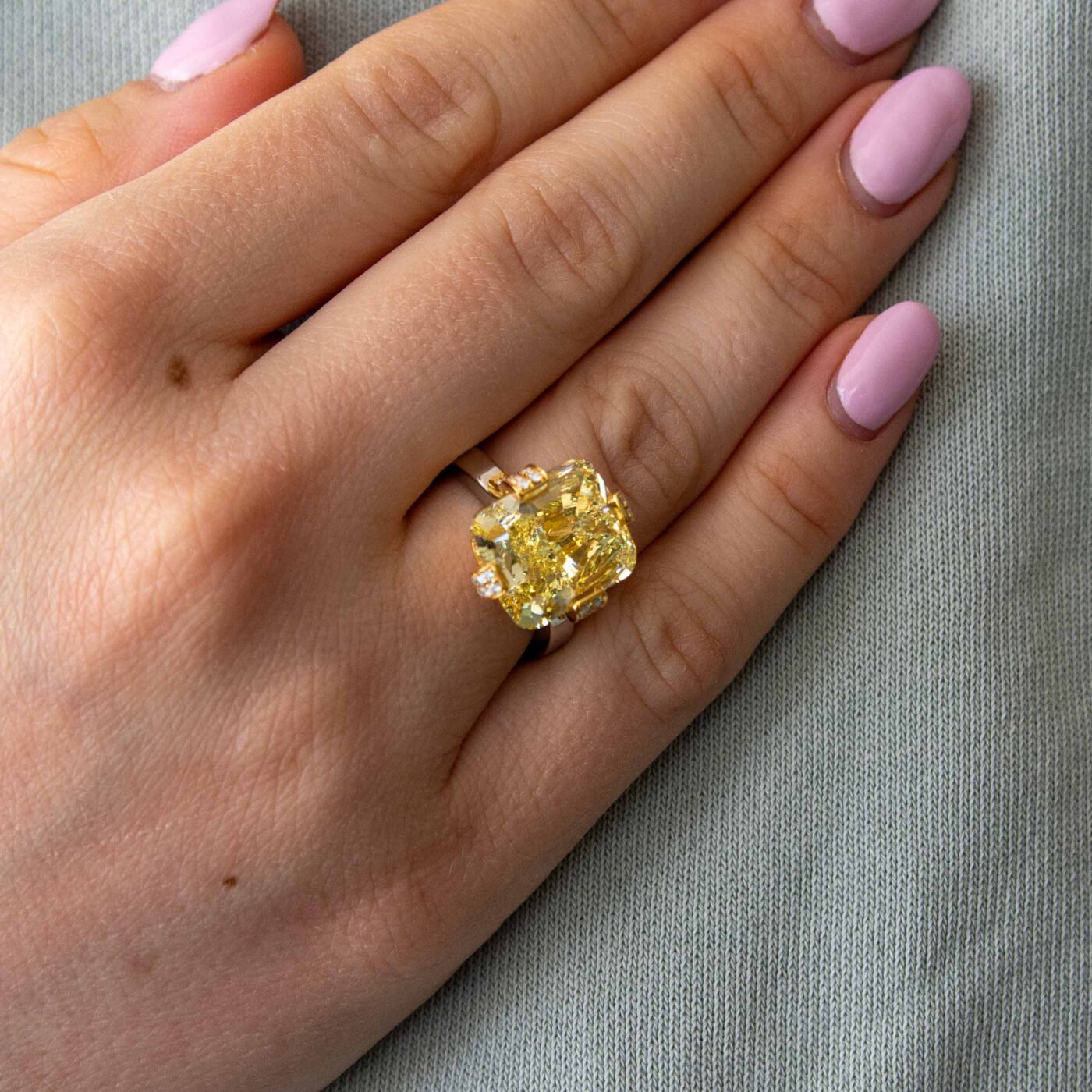 10.31 ct Radiant-Cut Fancy Intense Yellow Diamond Ring on Woman's Hand