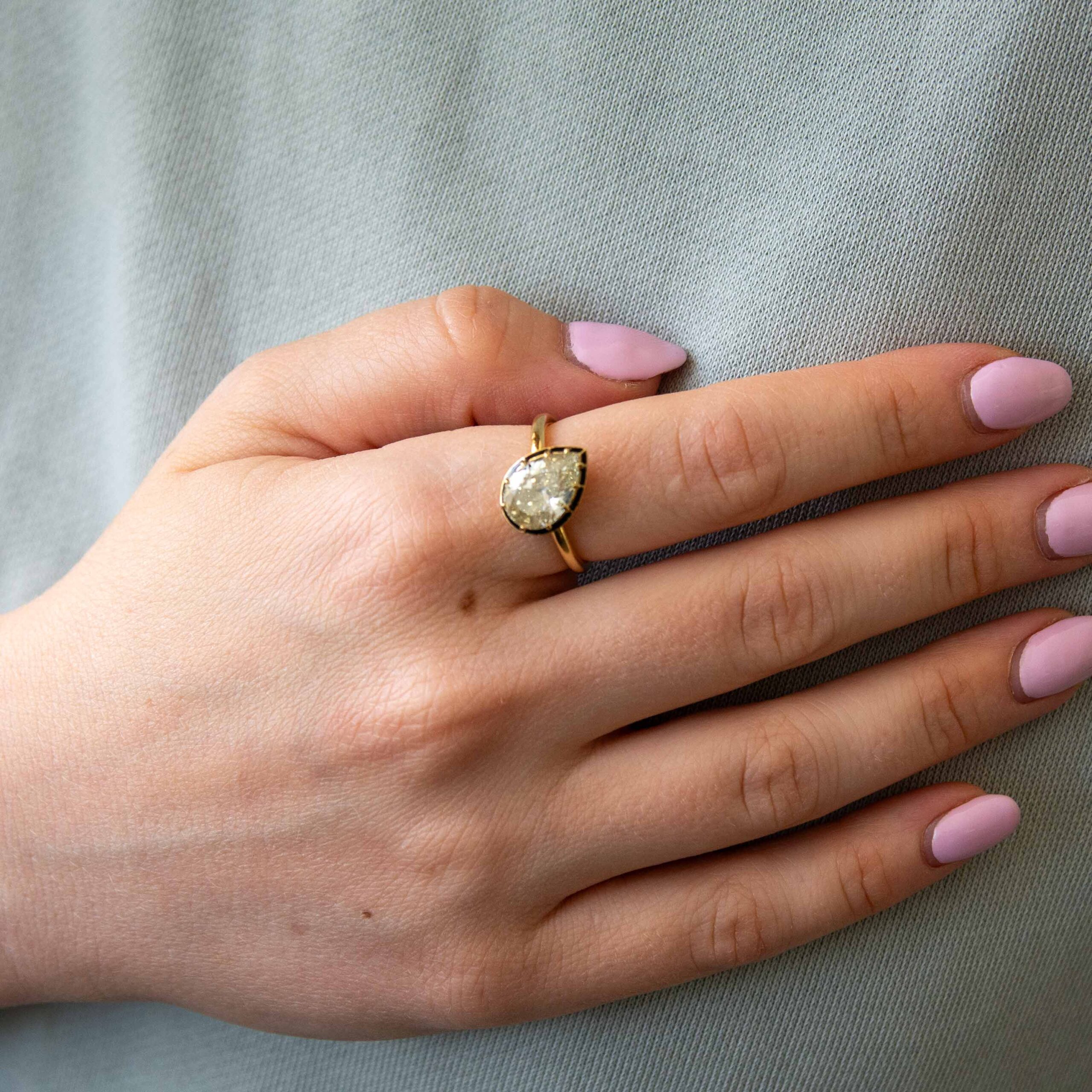 3.05ct Pear Fancy Light Brownish Greenish Yellow Diamond Ring on the Finger