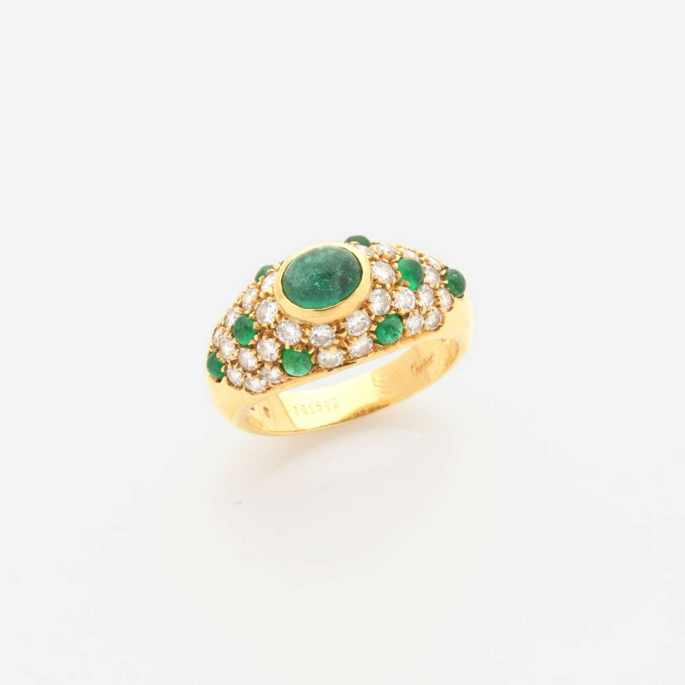 The Cartier Corinthe Emerald Ring on Gray Background