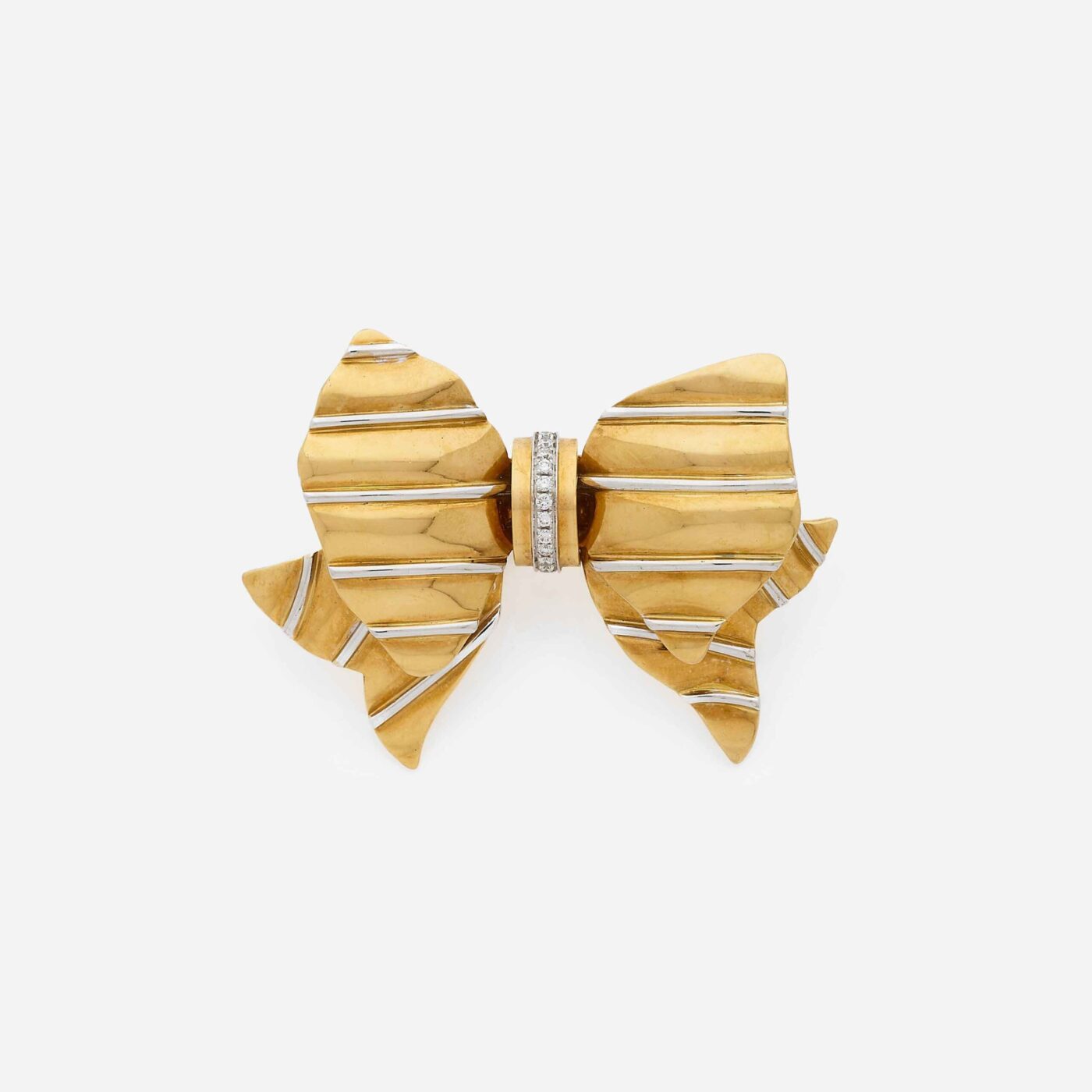 The Golden Bow Brooch on Gray Background