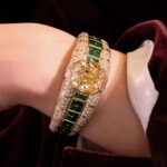 Bulgari Yellow Gold Diamond and Emerald Bangle on Hand