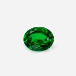 2.30 Ct Vivid Green Oval Tsavorite Garnet on Gray Background