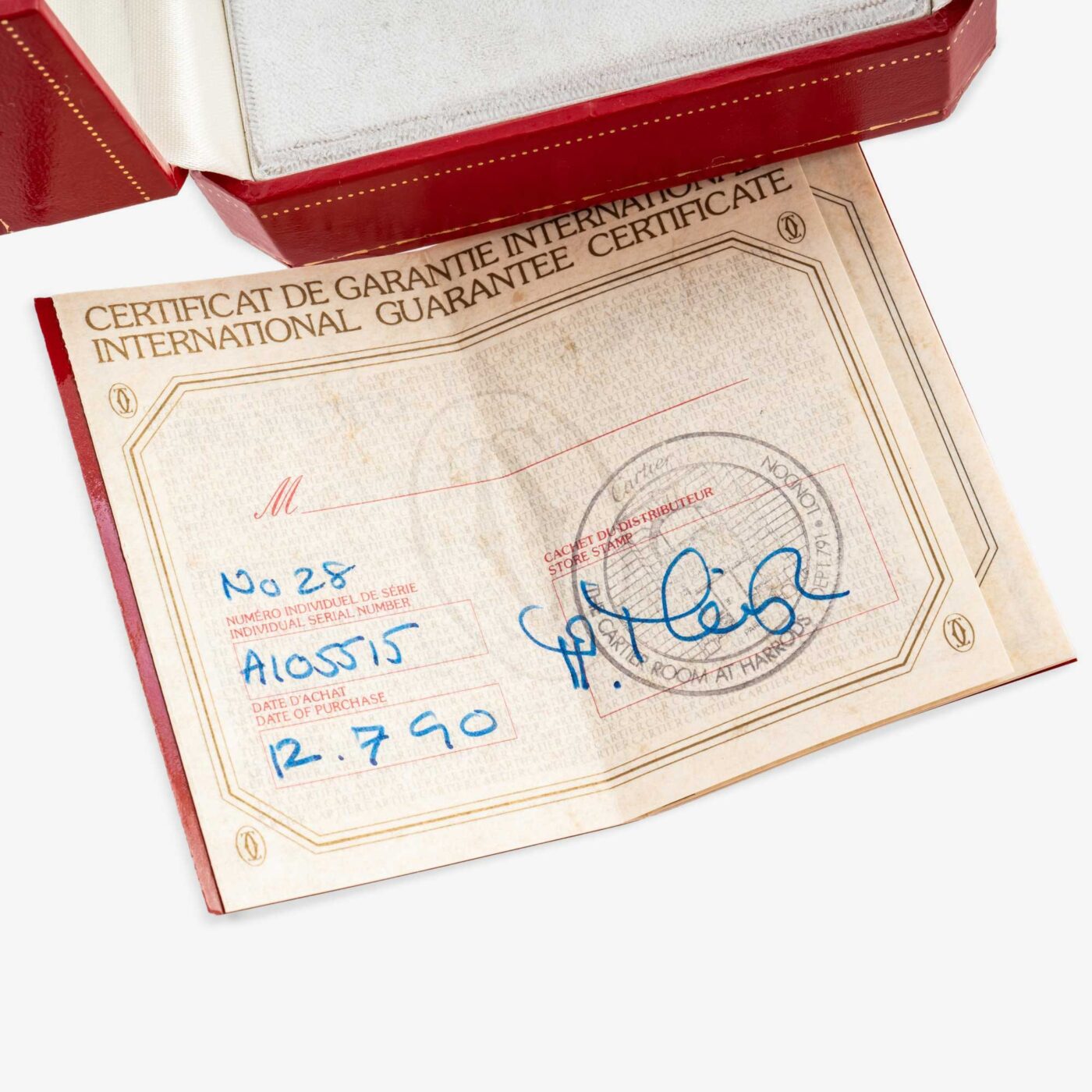 Cartier Tonneau Paris Handwound 18K Yellow Gold Watch, 1990 documents close up