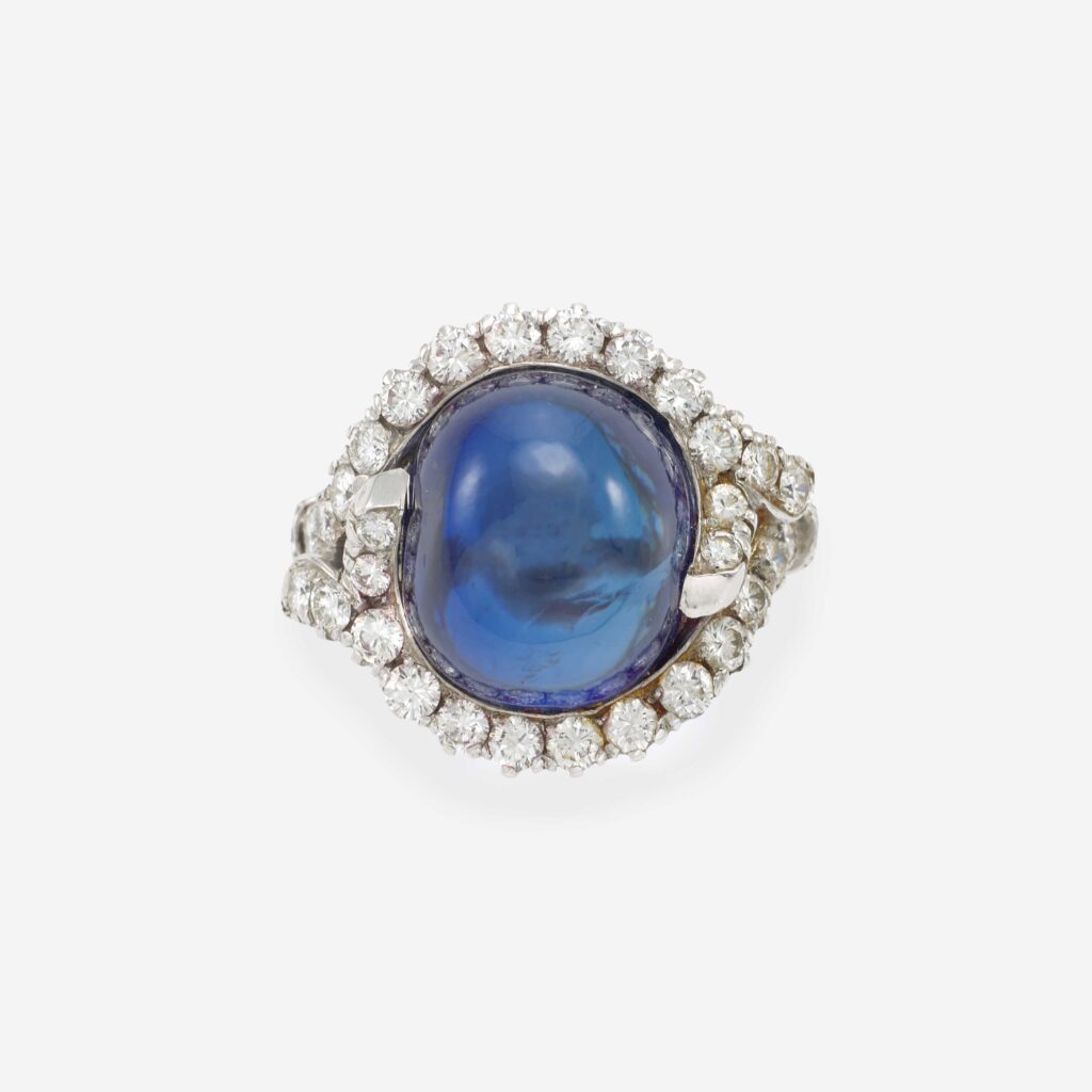 Platinum Ring with 22-Carat Sapphire Cabochon and Diamonds