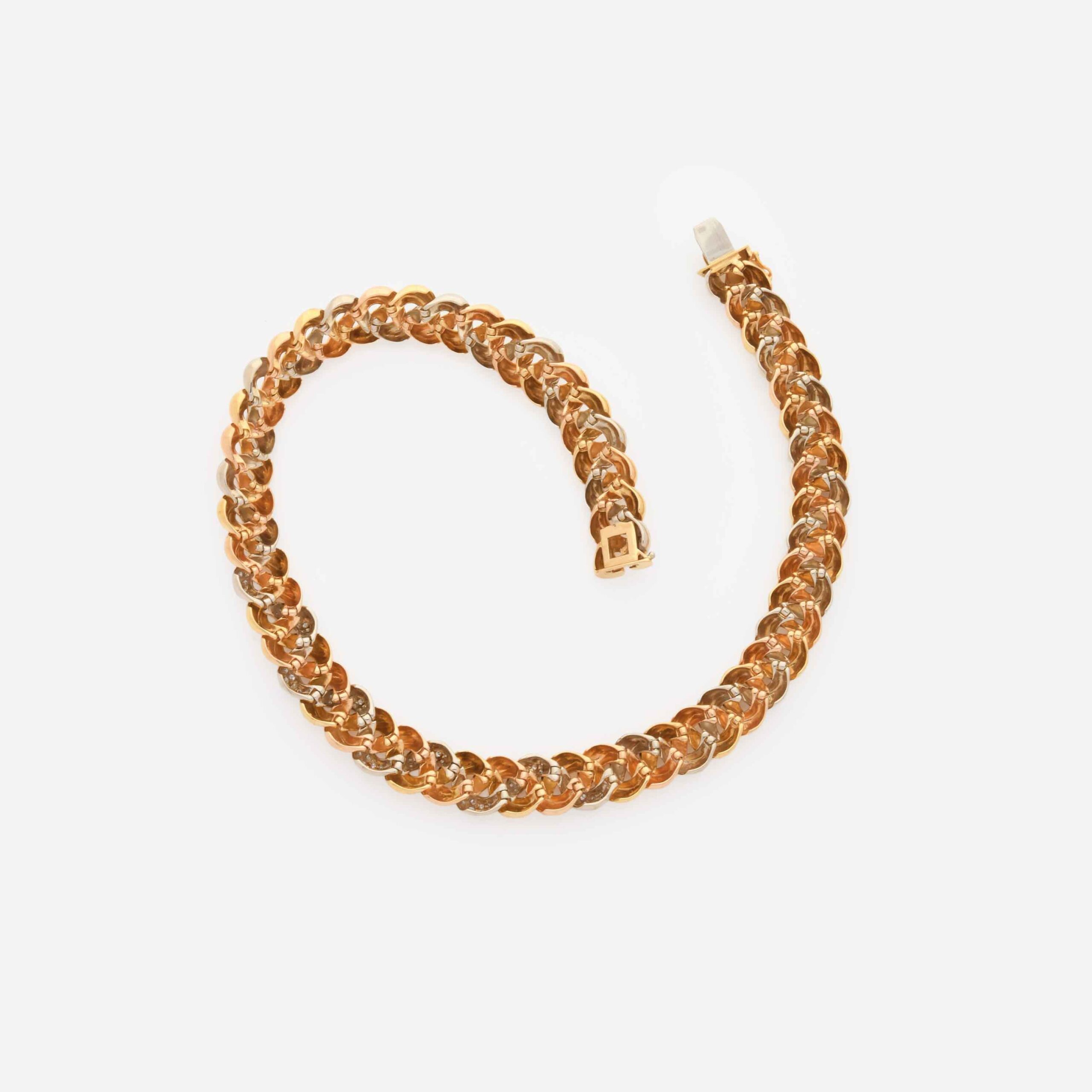 Poiray "Tresse" Three-Tone Gold and Diamond Necklace on Gray Background Back View