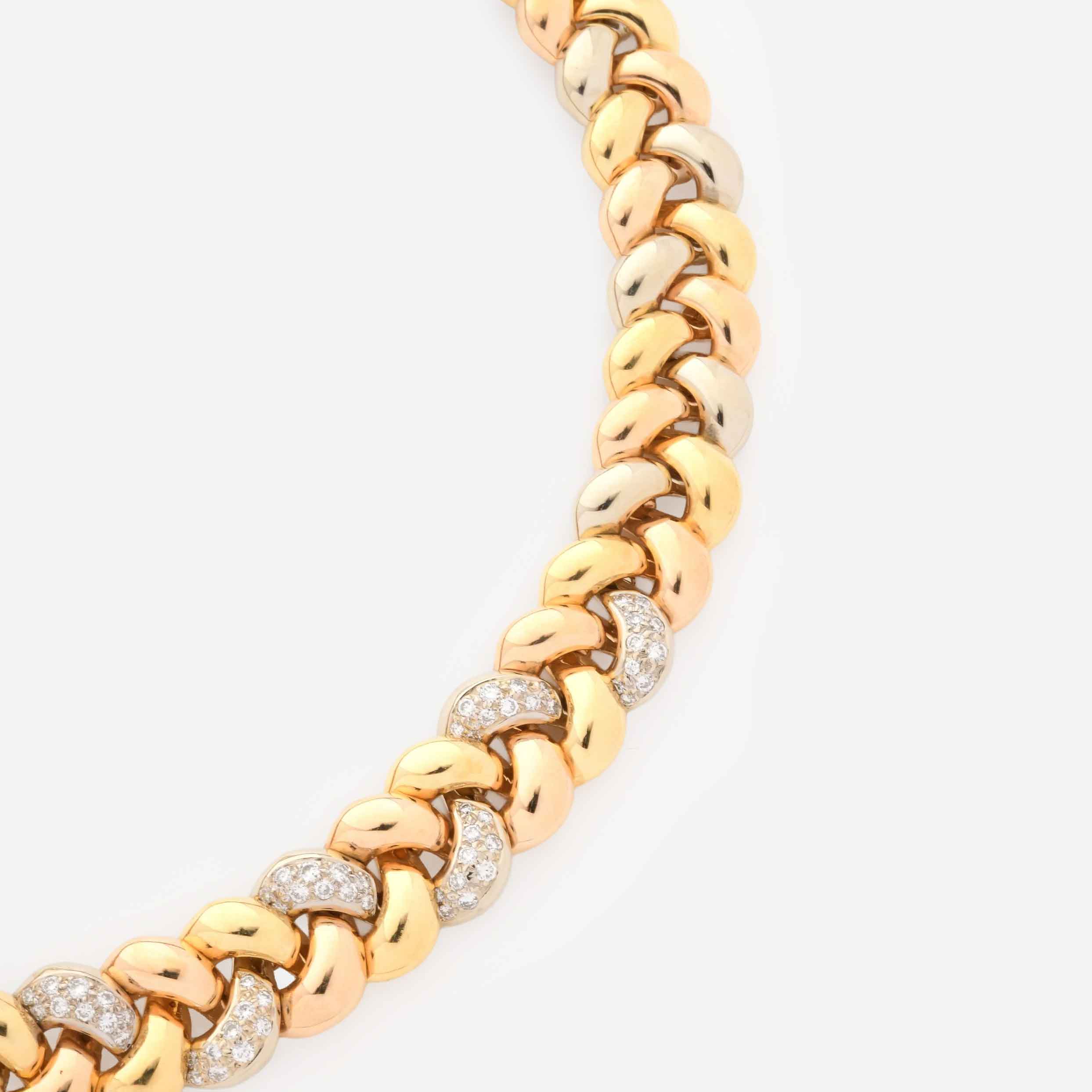 Poiray "Tresse" Three-Tone Gold and Diamond Necklace on Gray Background Back View Close Up