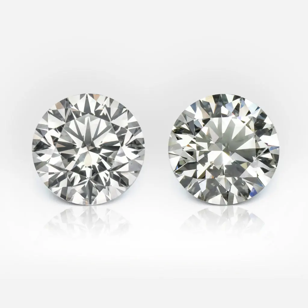 1.03 and 1.00 carat Pair of Faint Grey SI1 Round Shape Diamonds GIA