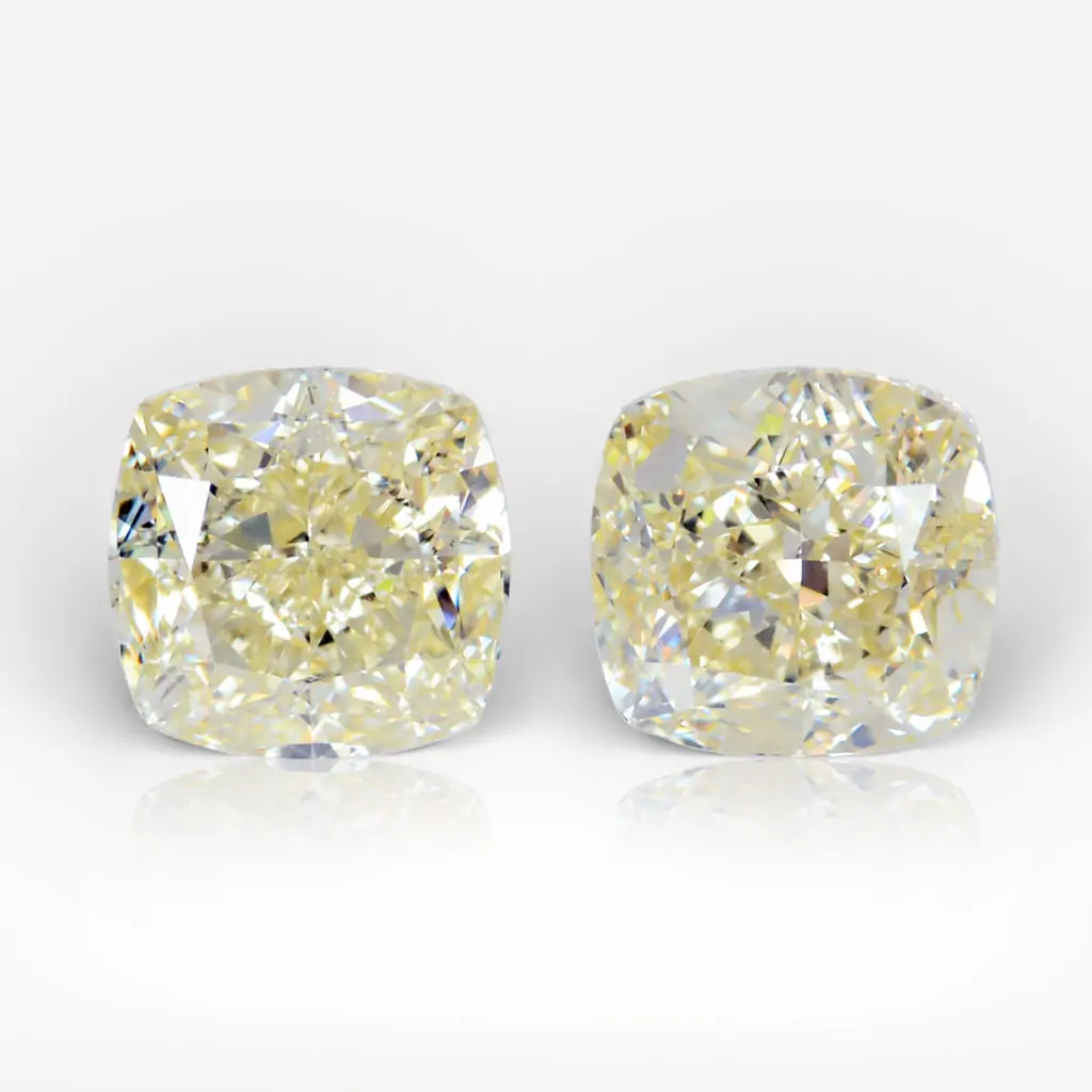 2.03 and 2.01 carat Pair of Yellow (W-X) VS1/VVS2 Cushion Shape Diamonds GIA