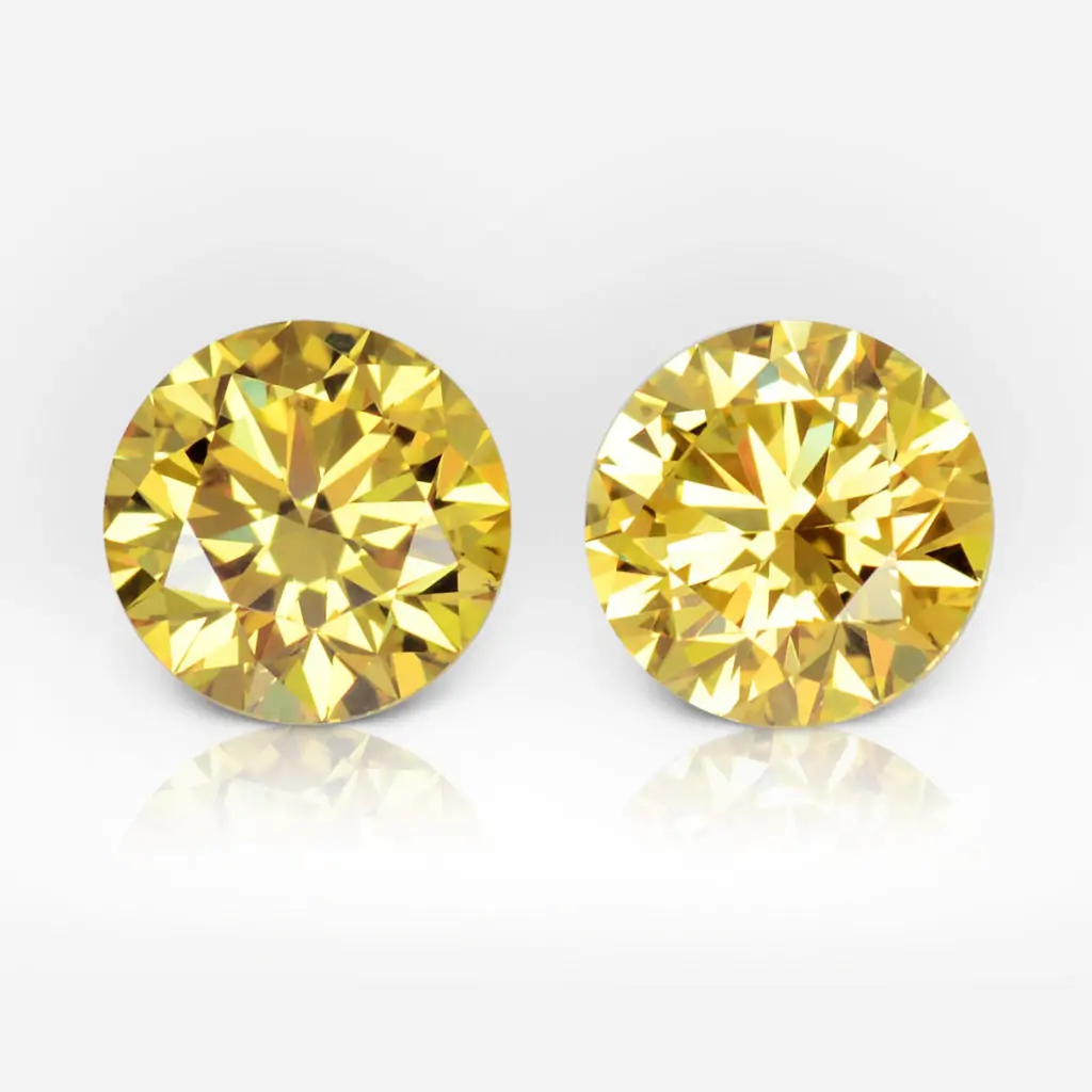 0.80 and 0.80 carat Pair of Fancy Vivid Yellow, Fancy Deep Yellow VS2, SI1 Round Shape Diamonds GIA