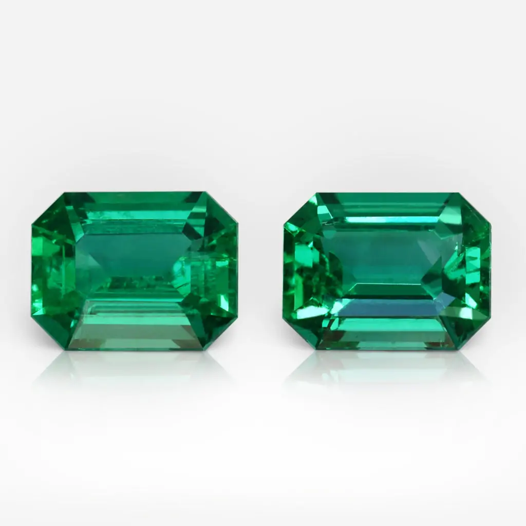 1.69 and 1.77 carat Pair of Green Emerald Shape Zambian Emerald