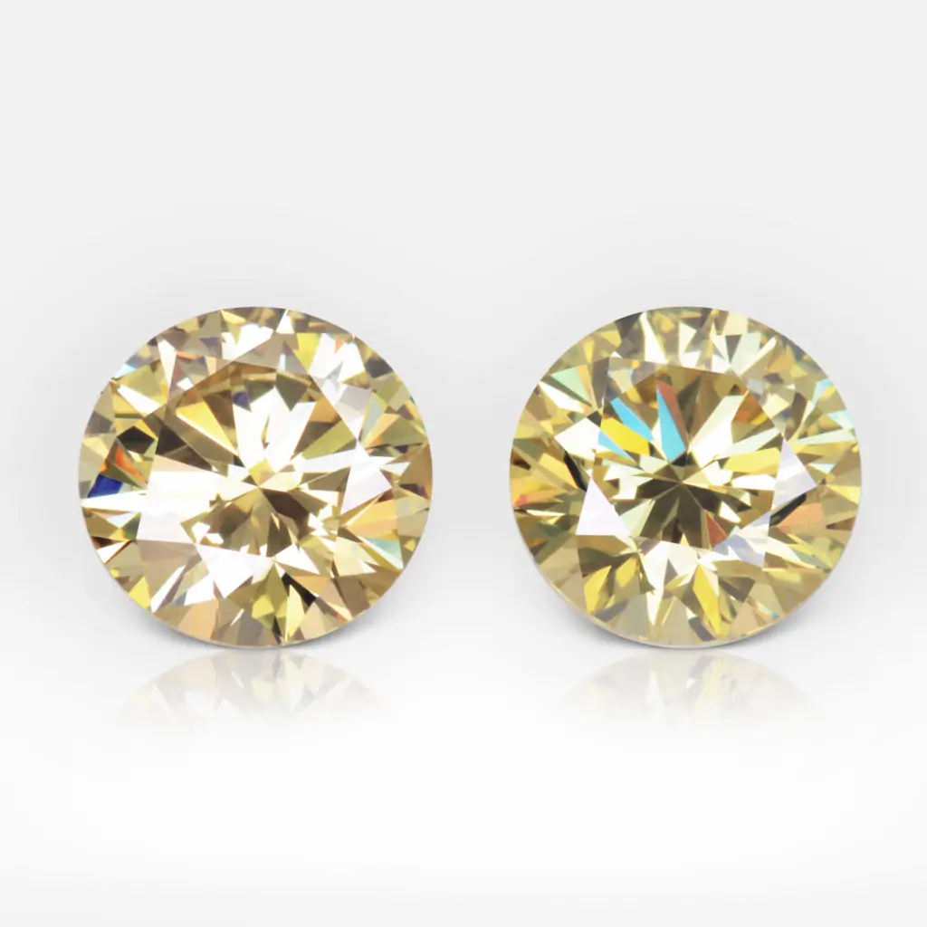 1.53 and 1.58 carat Pair of Fancy Intense Yellow VS2 Round Shape Diamonds GIA