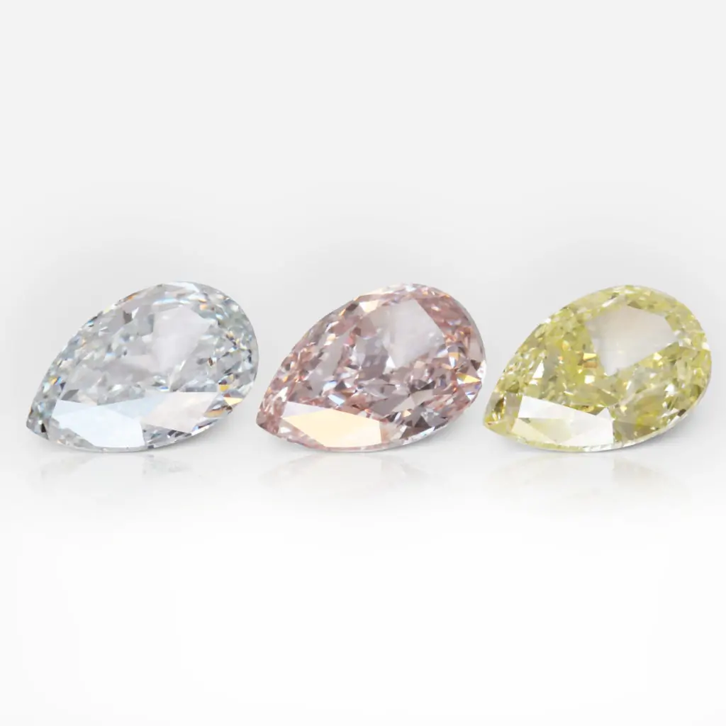 1.04, 0.90 and 1.01 carat Triple Set of Fancy Light Green, Fancy Orangy Pink and Fancy Intense Green-Yellow Pear Shape Diamonds GIA