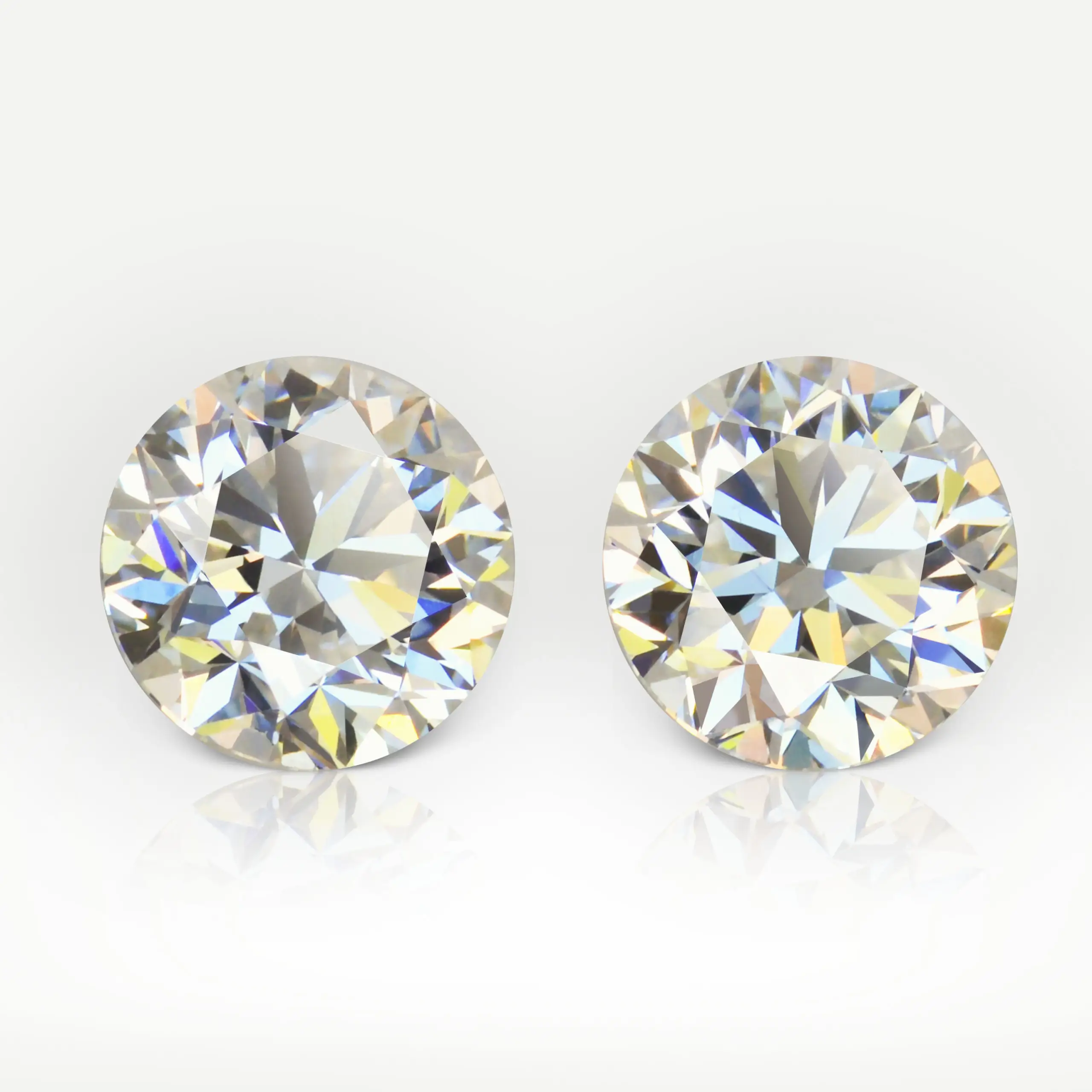 1.04 and 1.01 carat Pair of H VS2 Round Shape Diamonds GIA - picture 1