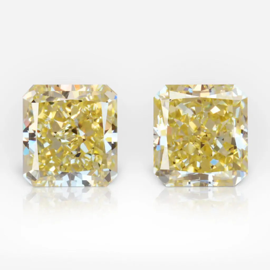 1.79 and 1.80 carat Pair of Fancy Yellow VVS2 / VS1 Radiant Shape Diamonds GIA