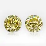 1.01 and 1.13 carat Pair of Fancy Intense Yellow VS1 / VS2 Studs Round Shape Diamonds GIA - thumb picture 1