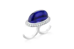 Boucheron d?me ring set with a 43 95 cts cabochon tanzanite paved with diamonds on white gold