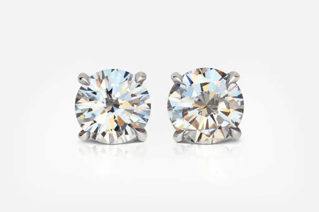 1.01 and 1.01 carat Studs Pair E VVS1 VS1 Round Shape Diamonds GIA