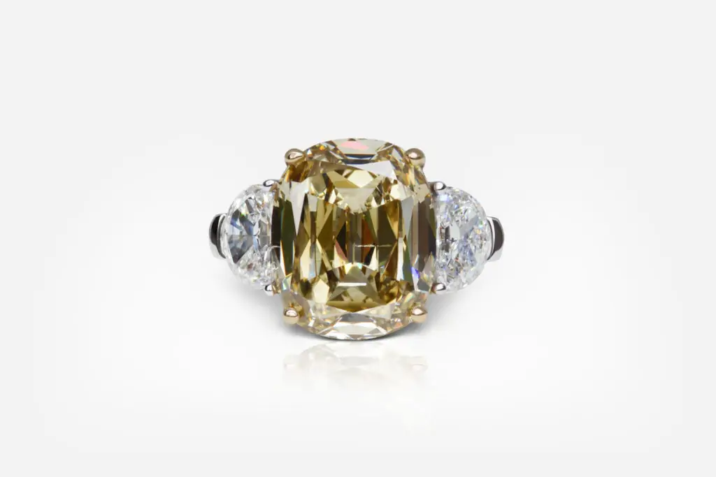 8.19 carat Fancy Deep Brownish Yellow SI1 Cushion Shape Diamond Ring GIA
