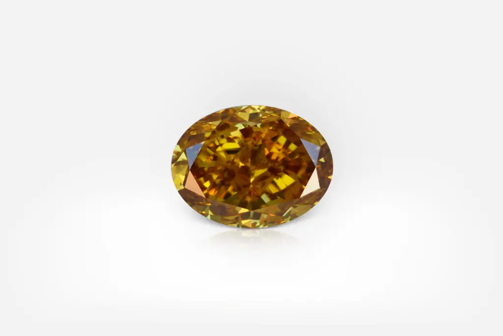 0.71 Carat Fancy Deep Brownish Orangy Yellow SI2 Oval Shape Diamond GIA