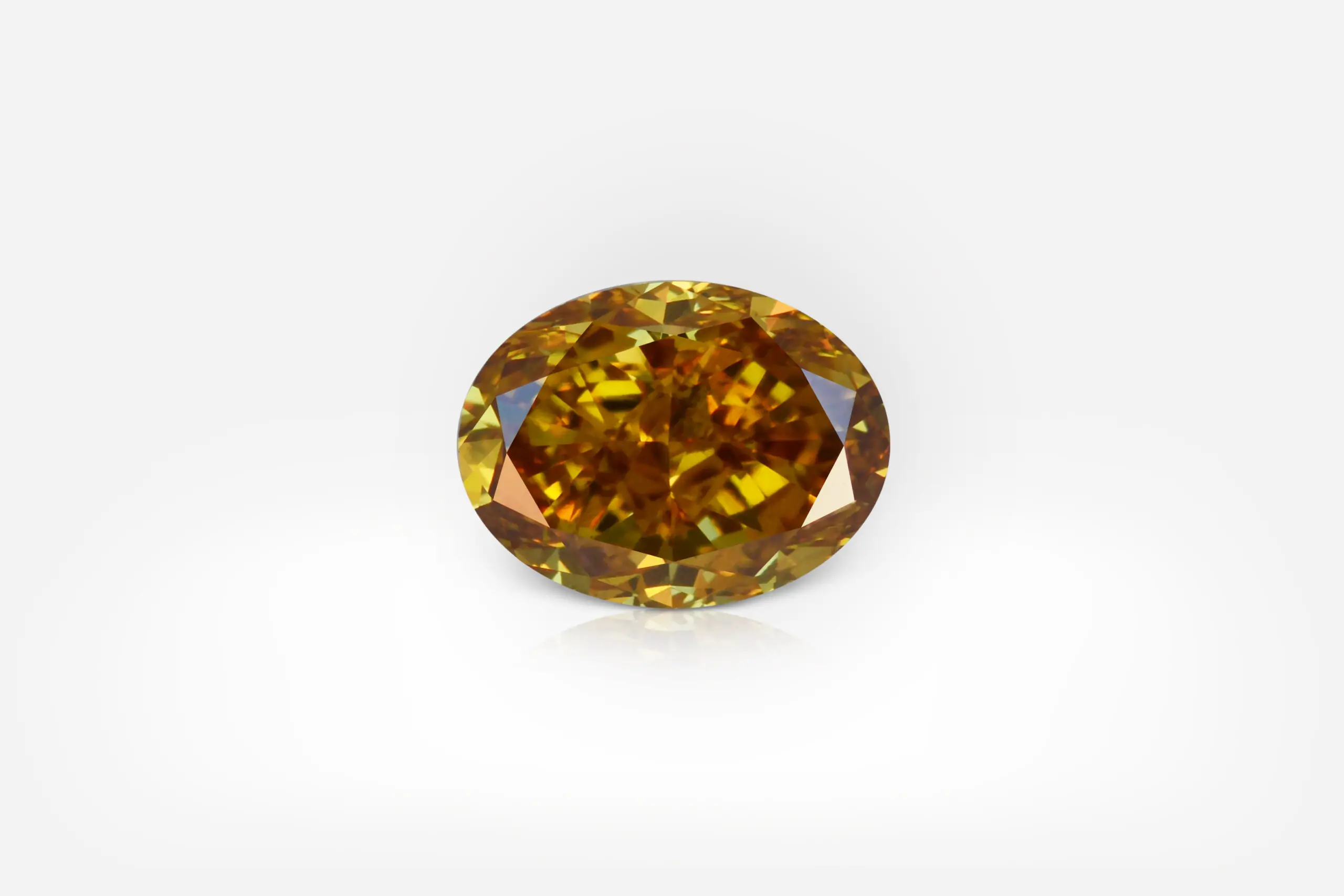 0.71 Carat Fancy Deep Brownish Orangy Yellow SI2 Oval Shape Diamond GIA - picture 1