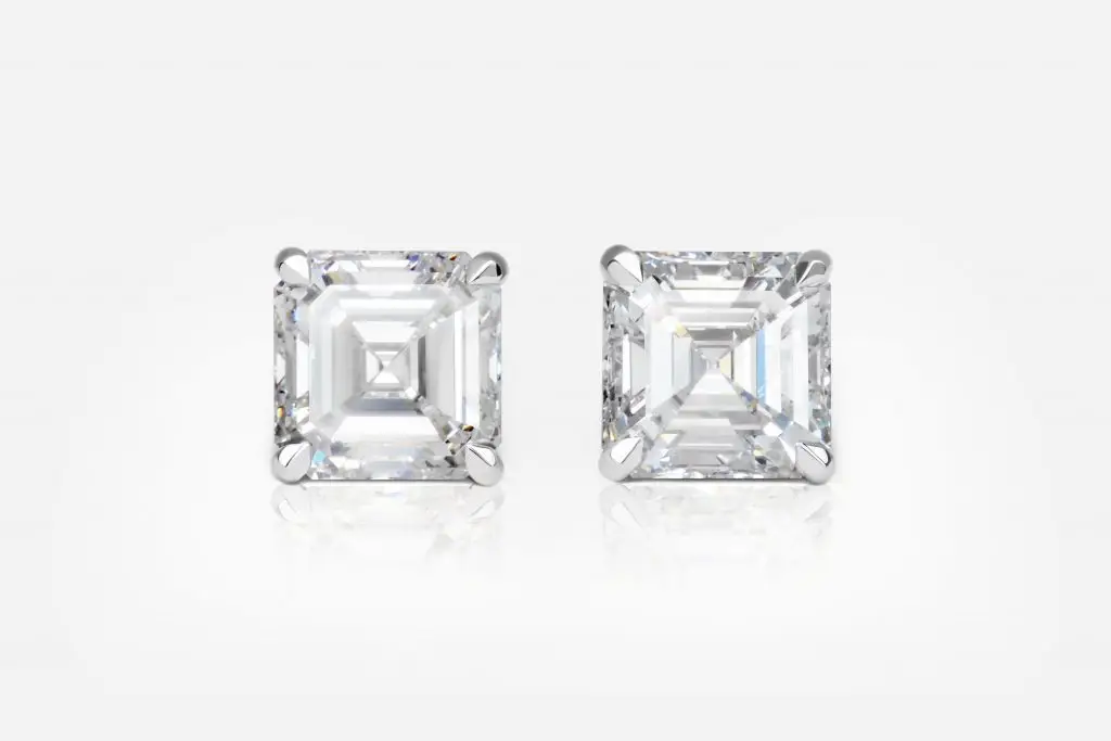 5.01 and 5.02 Carat Pair of H color Square Emerald Cut Shape Diamond Studs GIA